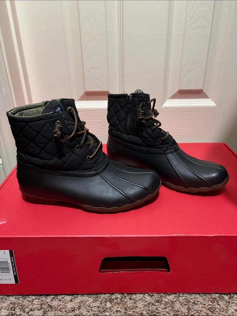 Sperry Black Quilted Duck Boots with Brown Trim